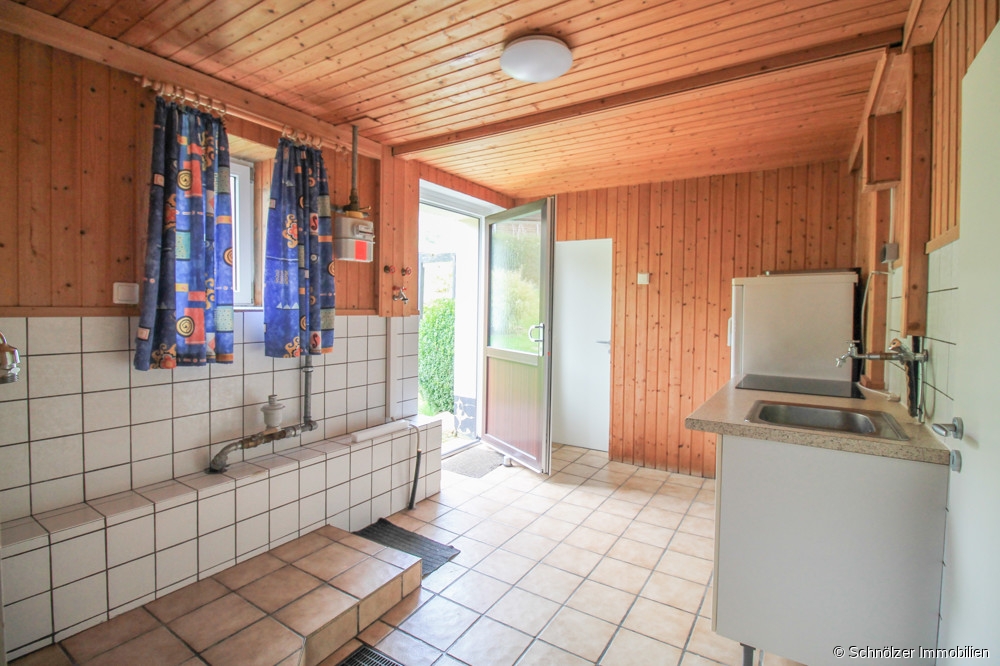 Hauswirtschaftsraum EG mit Zugang zum Garten