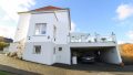 seitliche Ansicht mit Doppelcarport