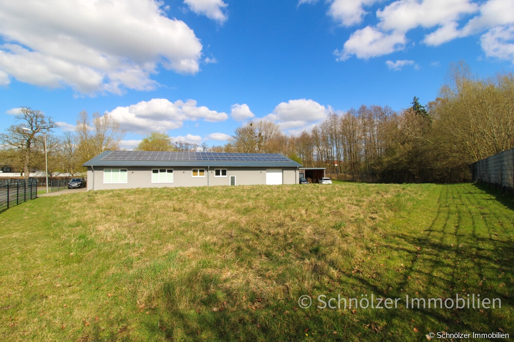 mit zusätzlichem Baugrundstück