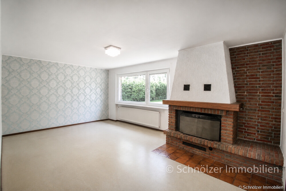 Wohnzimmer mit Kamin