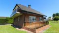 seitliche Ansicht mit Balkon und Terrasse