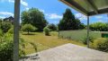 mit überdachter Terrasse