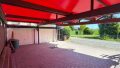 Carport mit zwei Garagen 