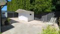 private Terrasse im hinteren Gartenbereich mit Sauna